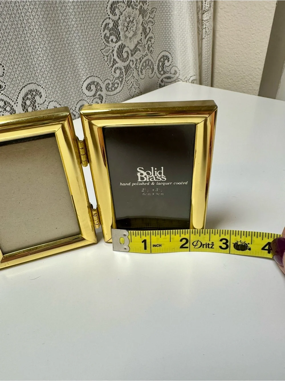 Vintage Gold Colored Solid Brass Double Hinged Picture Frame. Each is 2”x3”.